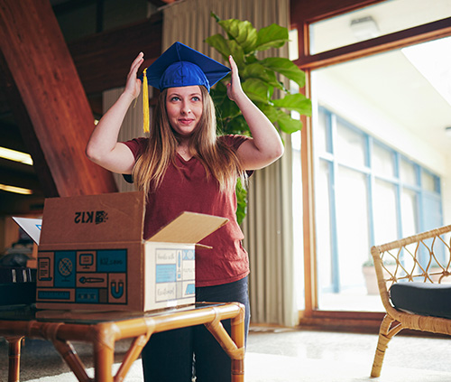 young woman getting her graduation cap