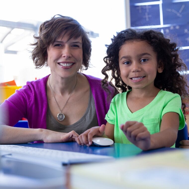 Mother and daughter smiling
