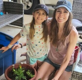 Second grader Aurora Shirey (pictured left) and her mother, Becky Shirey, enjoy gardening together. Aurora recently earned first place in the Oklahoma Virtual Charter Academy elementary school science fair. Photo provided.