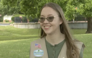 Zoe O. during an interview, smiling as she shares her story of perseverance and success.
