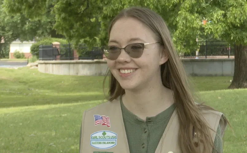 Zoe O. during an interview, smiling as she shares her story of perseverance and success.